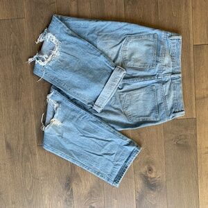 Ripped jeans, refugee denim